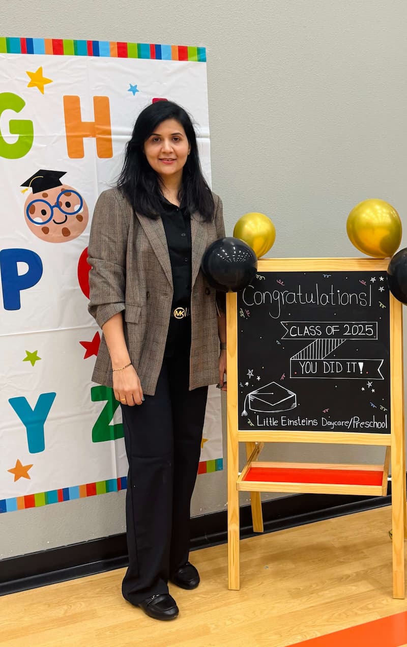 Pallavi Mane, founder of Little Einsteins Daycare, smiling in the classroom